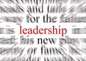 Blurred text with a focus on leadership